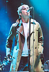 https://upload.wikimedia.org/wikipedia/commons/thumb/6/6a/Liam_Gallagher.jpg/100px-Liam_Gallagher.jpg